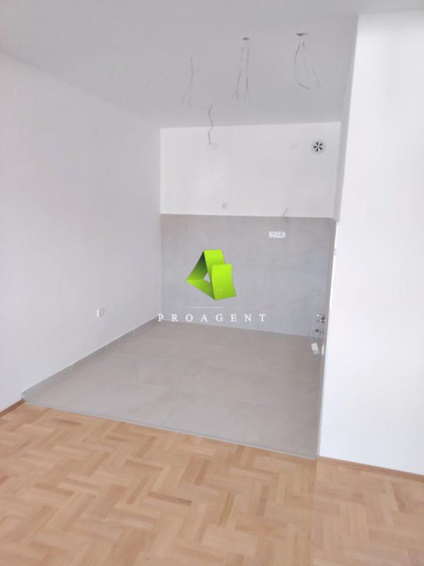 Slika 1 - Garsonjera u novoj zgradi na odličnoj lokaciji u centru ID#7433