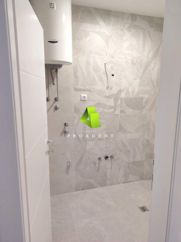 Slika 4 - Garsonjera u novoj zgradi na odličnoj lokaciji u centru ID#7433