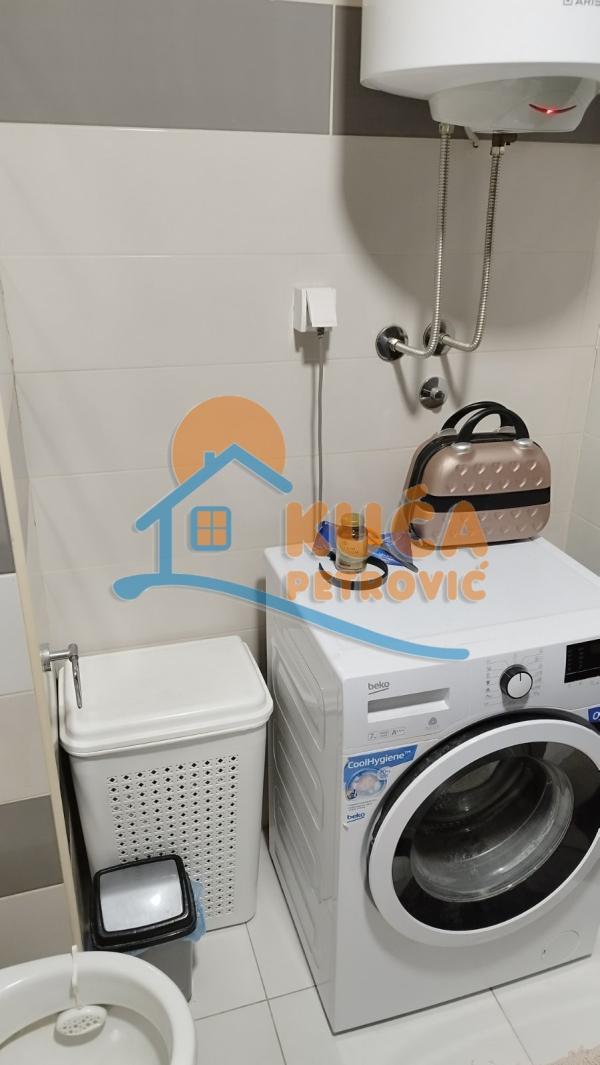 Slika 10 - Stan u zgradi, novogradnja, uknjižen, grejanje na struju, oglas ID p-015369