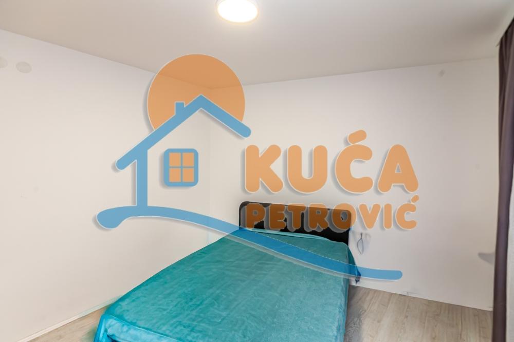 Slika 5 - Stan u zgradi, novogradnja, uknjižen, etažno grejanje, oglas ID p-015581