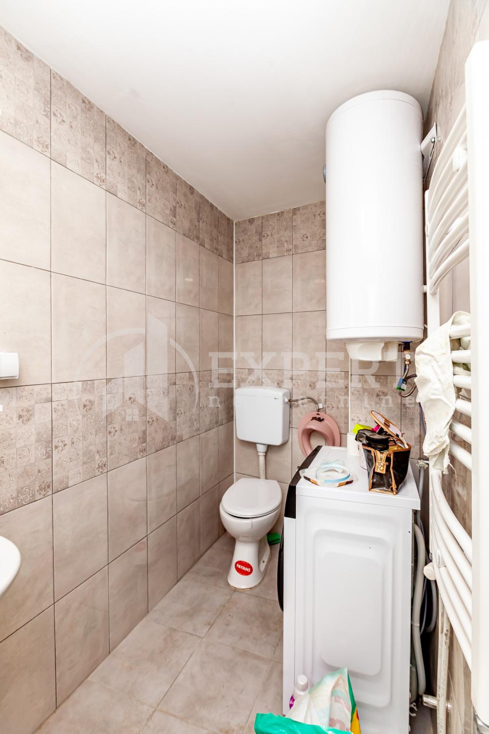 Slika 10 - Stan u zgradi, novogradnja, uknjižen, etažno grejanje, oglas ID p-015581