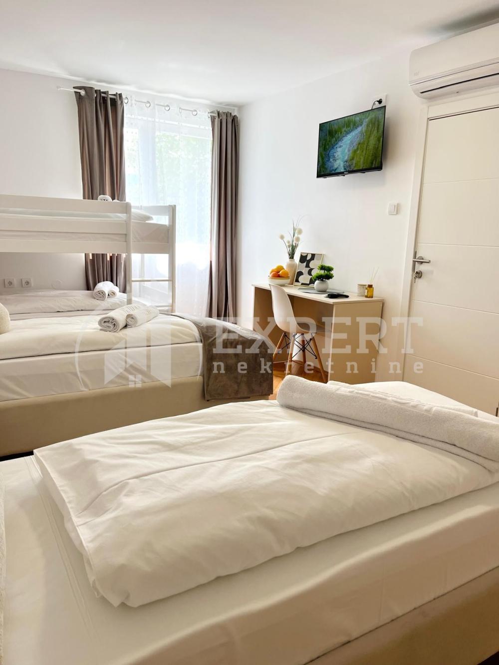 Slika 5 - Stan u zgradi, uknjižen, grejanje na struju, oglas ID p-015652