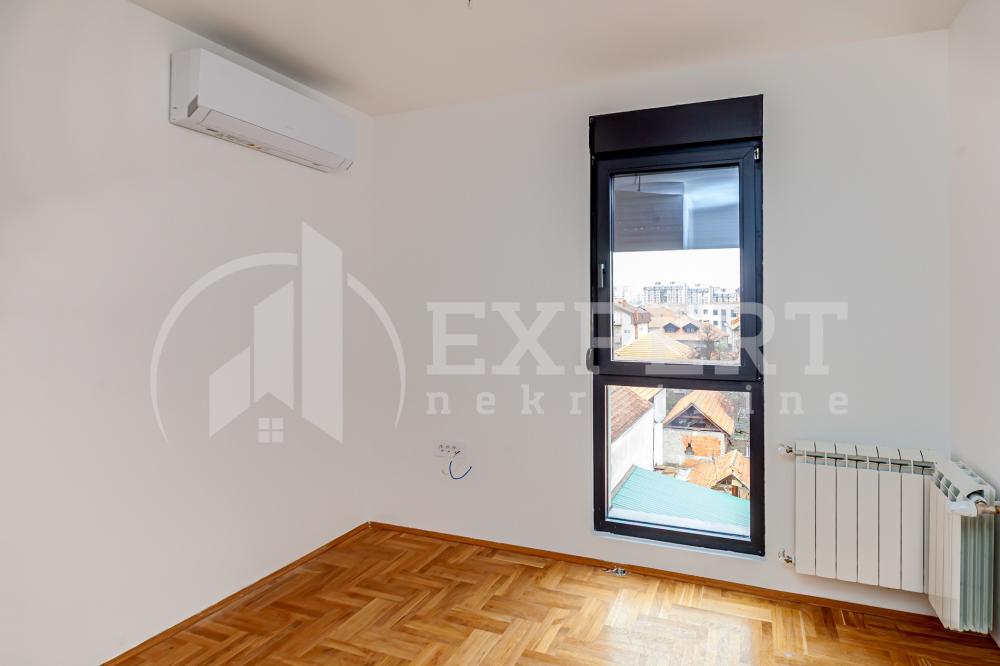 Slika 10 - Stan u zgradi, novogradnja, uknjižen, etažno grejanje, oglas ID p-015729