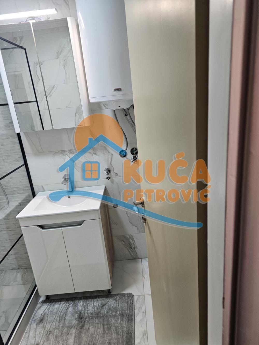 Slika 8 - Stan u zgradi, uknjižen, centralno grejanje, oglas ID p-015941