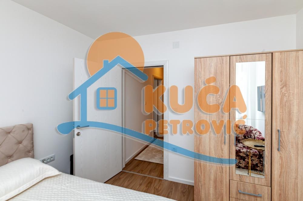 Slika 9 - Stan u zgradi, novogradnja, uknjižen, etažno grejanje, oglas ID p-015996