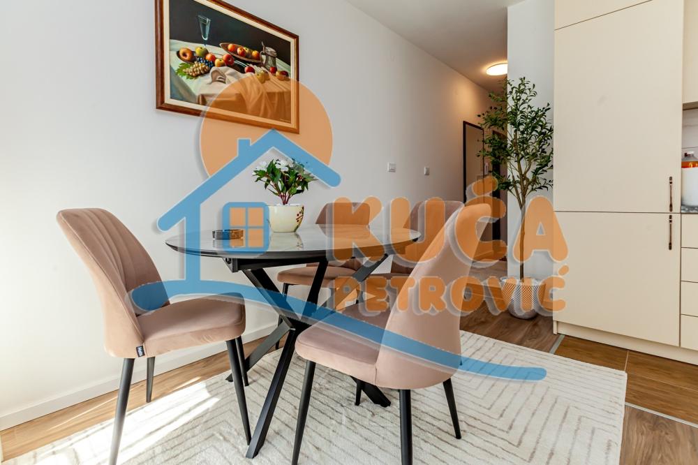 Slika 4 - Stan u zgradi, novogradnja, uknjižen, etažno grejanje, oglas ID p-015996