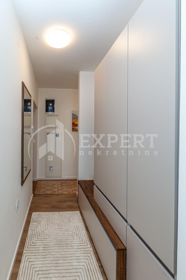 Slika 5 - Stan u zgradi, novogradnja, uknjižen, etažno grejanje, oglas ID p-015996