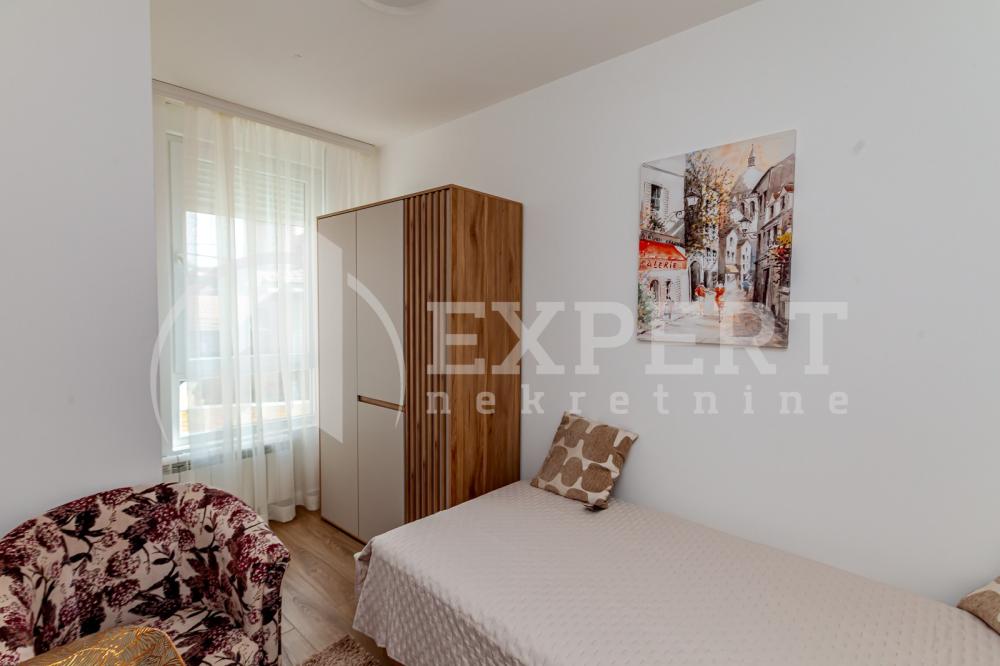 Slika 10 - Stan u zgradi, novogradnja, uknjižen, etažno grejanje, oglas ID p-015996