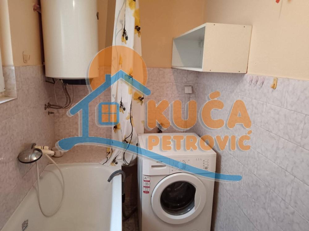 Slika 6 - Stan u zgradi, uknjižen, etažno grejanje, oglas ID p-016038