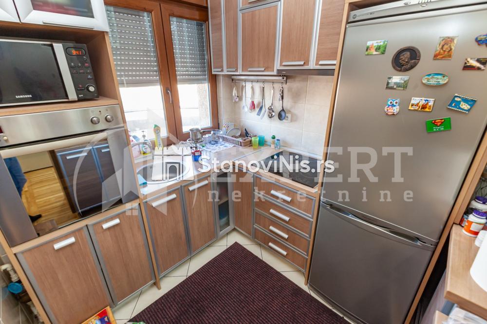 Slika 6 - Stan u zgradi, novogradnja, uknjižen, centralno grejanje, oglas ID p-07942