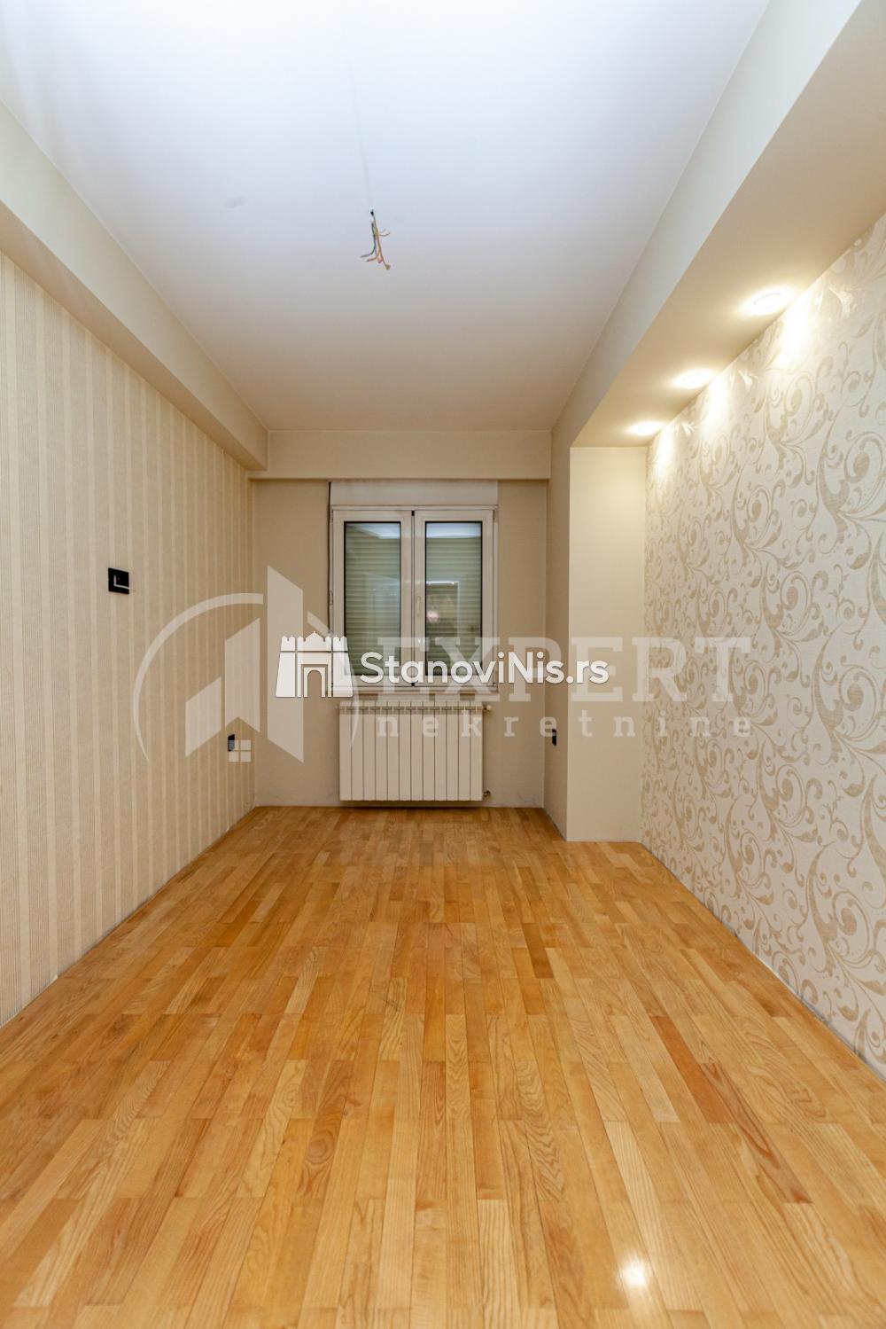 Slika 11 - Stan u zgradi, novogradnja, uknjižen, etažno grejanje, oglas ID p-05541