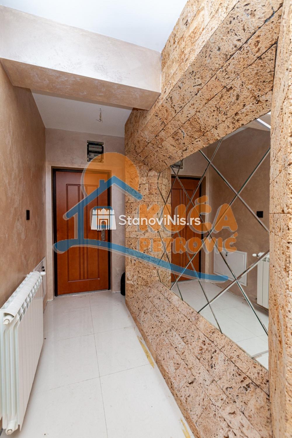 Slika 6 - Stan u zgradi, novogradnja, uknjižen, etažno grejanje, oglas ID p-05541