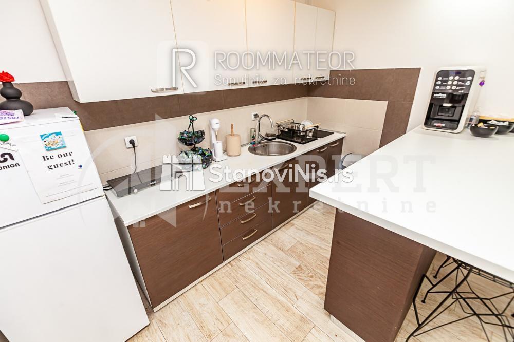 Slika 4 - Stan u zgradi, uknjižen, etažno grejanje, oglas ID p-010800