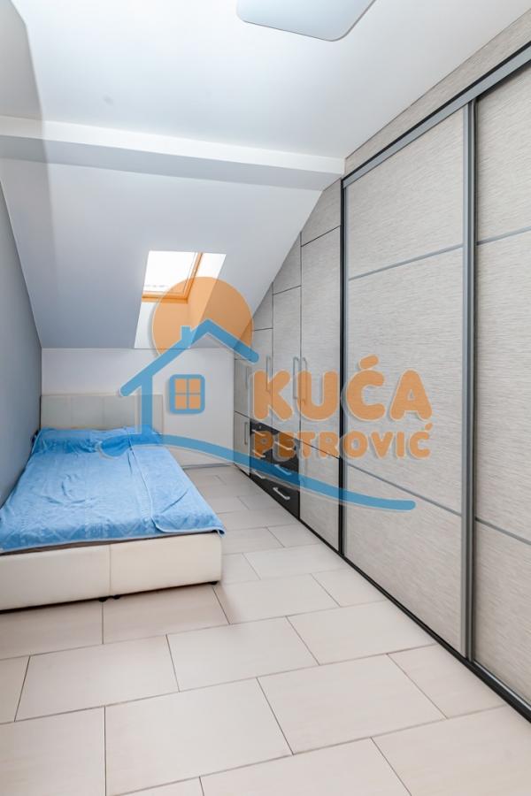 Slika 9 - Stan u zgradi, novogradnja, uknjižen, etažno grejanje, oglas ID p-012882