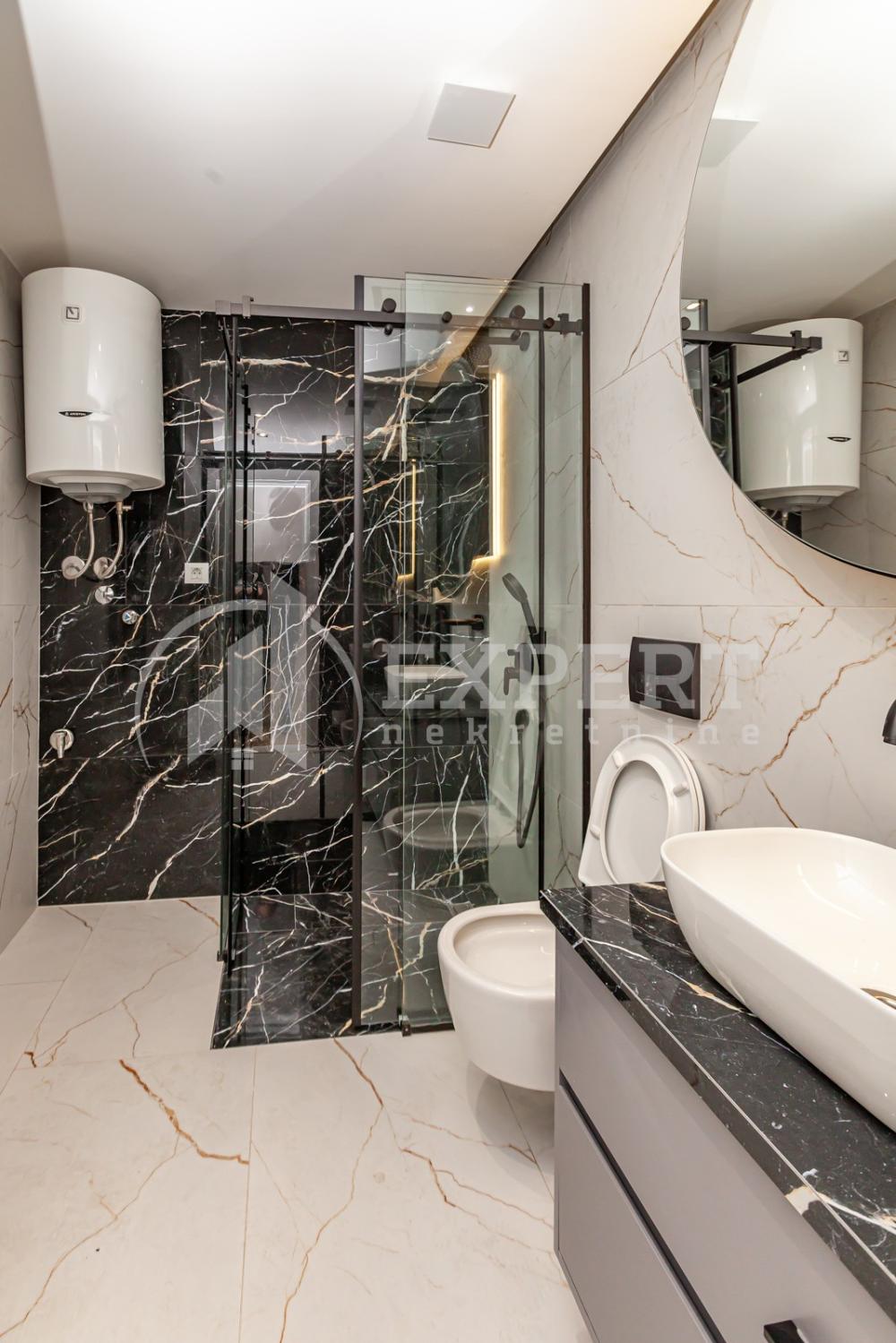 Slika 4 - Stan u zgradi, novogradnja, uknjižen, etažno grejanje, oglas ID p-013661