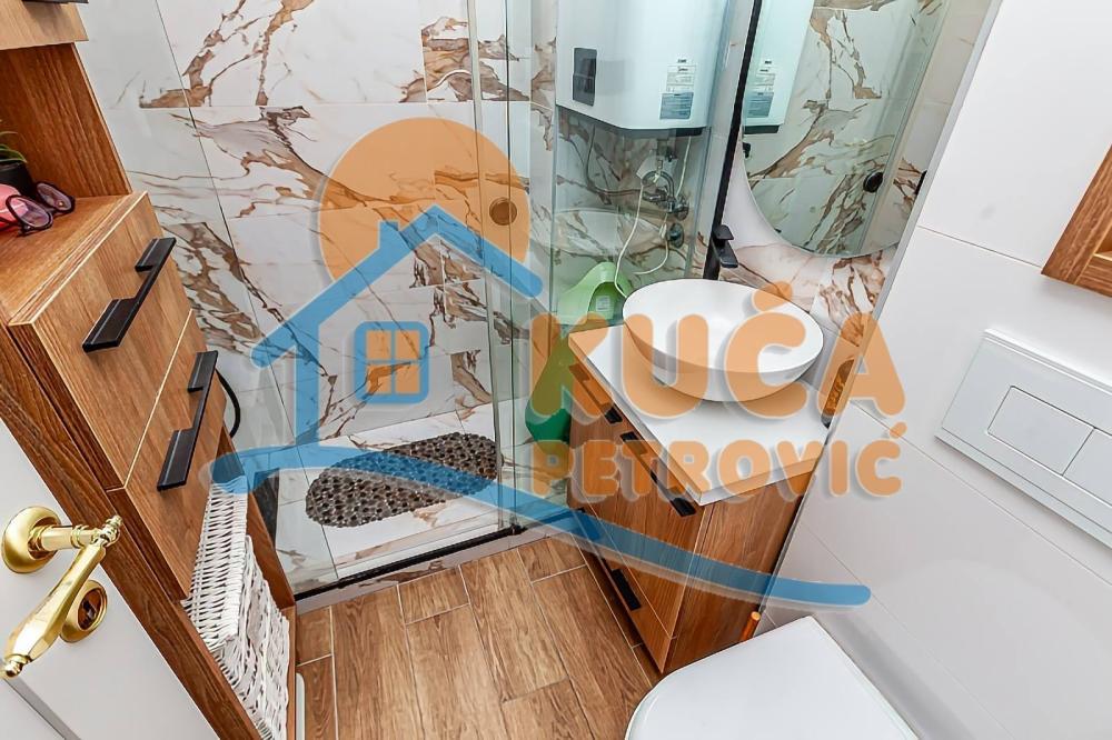 Slika 4 - Stan u zgradi, uknjižen, centralno grejanje, oglas ID p-014071