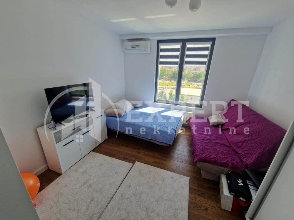 Slika 7 - Stan u zgradi, novogradnja, uknjižen, etažno grejanje, oglas ID p-014324