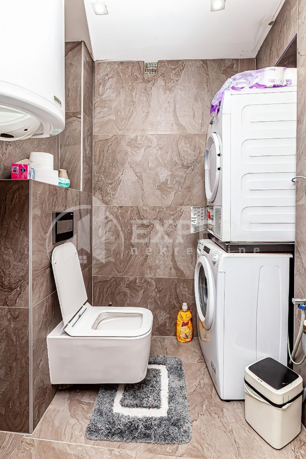 Slika 11 - Stan u zgradi, uknjižen, etažno grejanje, oglas ID p-014322