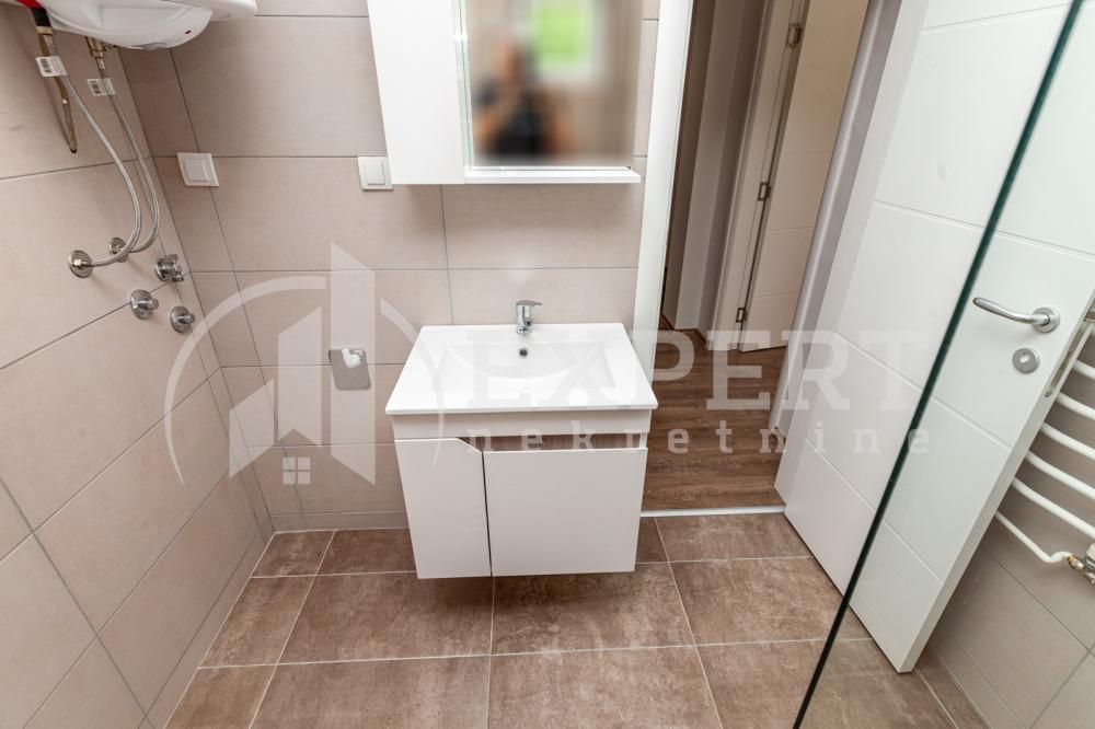 Slika 9 - Stan u zgradi, novogradnja, uknjižen, etažno grejanje, oglas ID p-06739