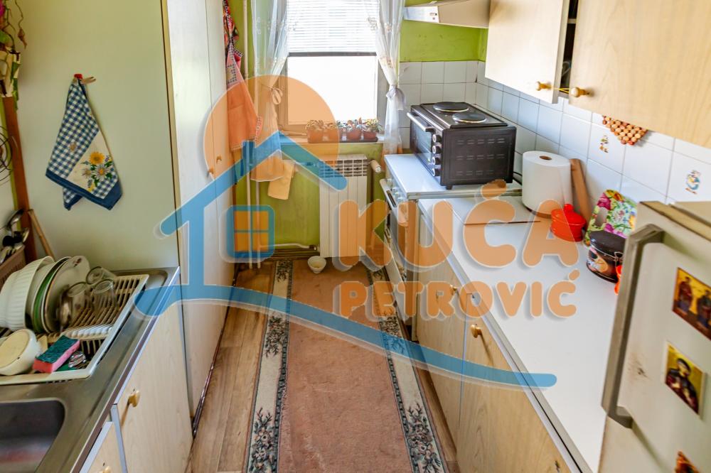 Slika 5 - Stan u zgradi, uknjižen, etažno grejanje, oglas ID p-014402