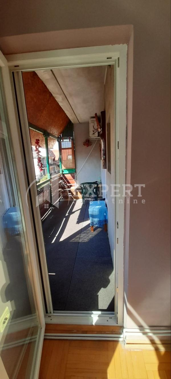 Slika 6 - Stan u zgradi, uknjižen, etažno grejanje, oglas ID p-014854