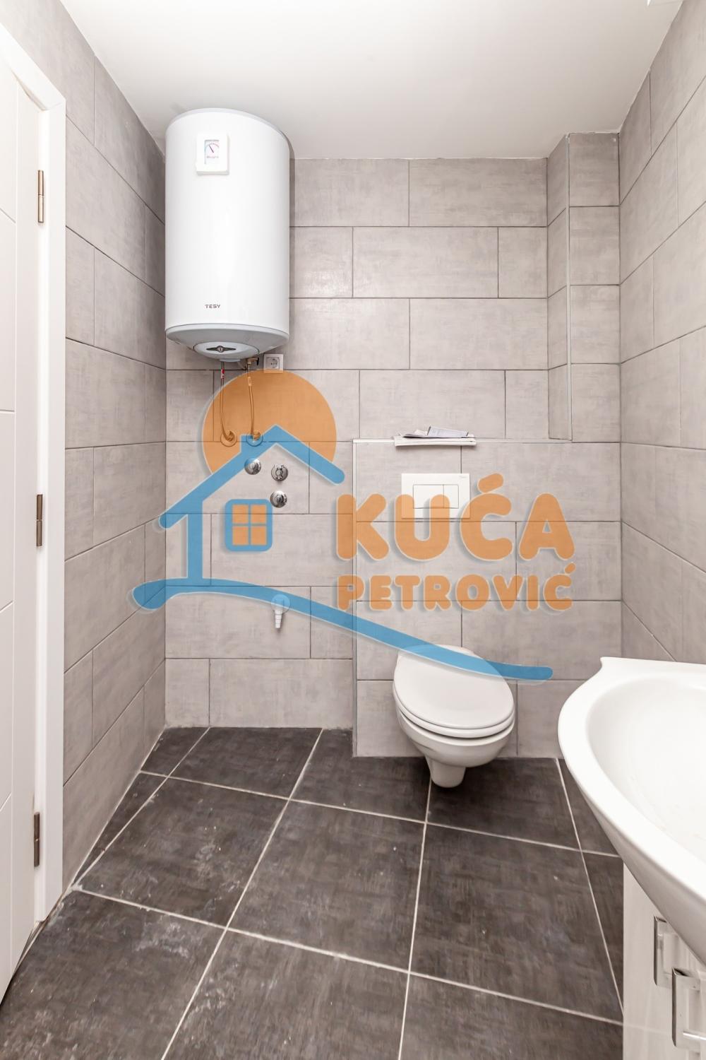 Slika 6 - Stan u zgradi, novogradnja, uknjižen, etažno grejanje, oglas ID p-014614