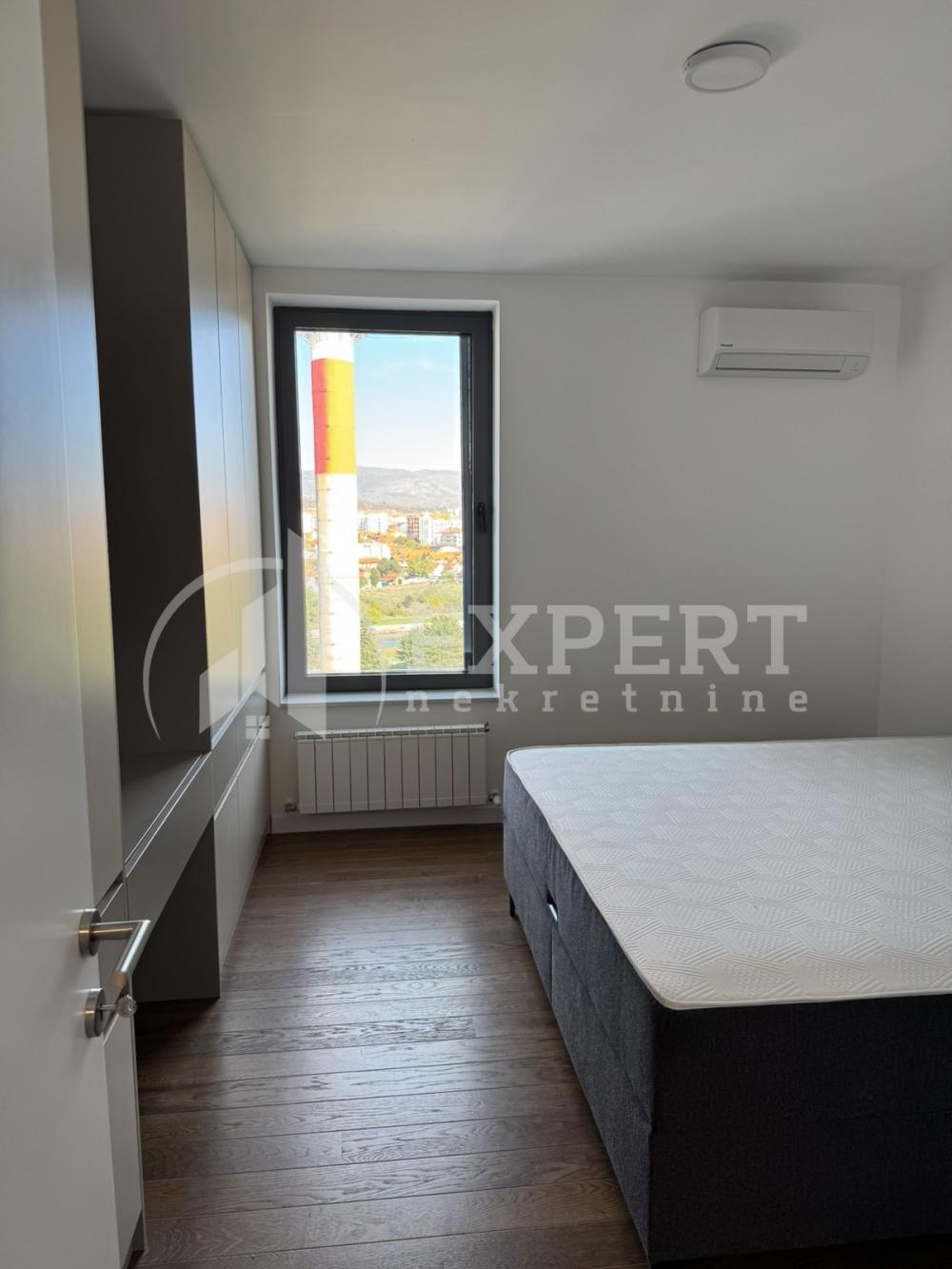 Slika 1 - Stan u zgradi, novogradnja, uknjižen, centralno grejanje, oglas ID p-015202