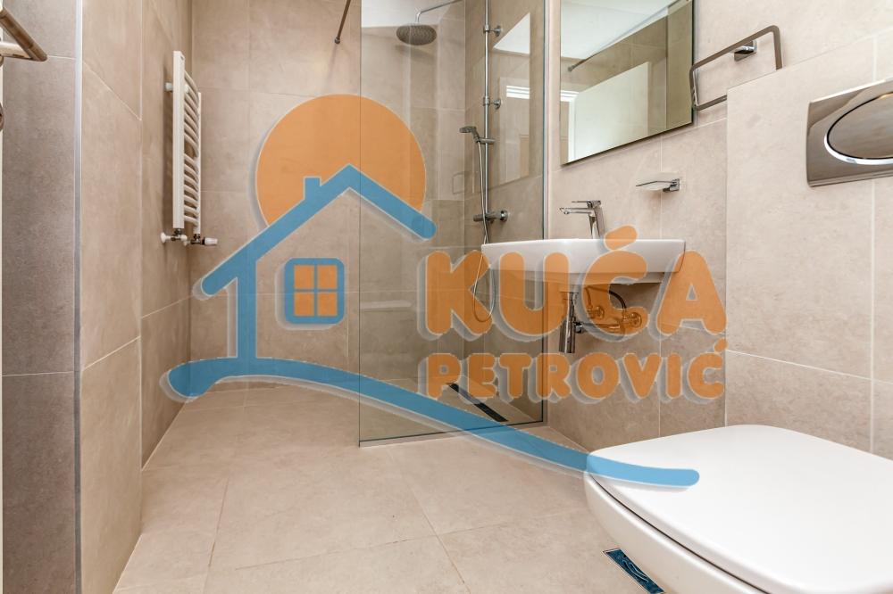 Slika 6 - Stan u zgradi, novogradnja, uknjižen, centralno grejanje, oglas ID p-015139