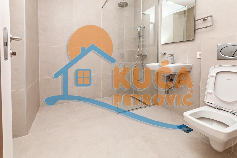 Slika 6 - Stan u zgradi, novogradnja, uknjižen, centralno grejanje, oglas ID p-015141