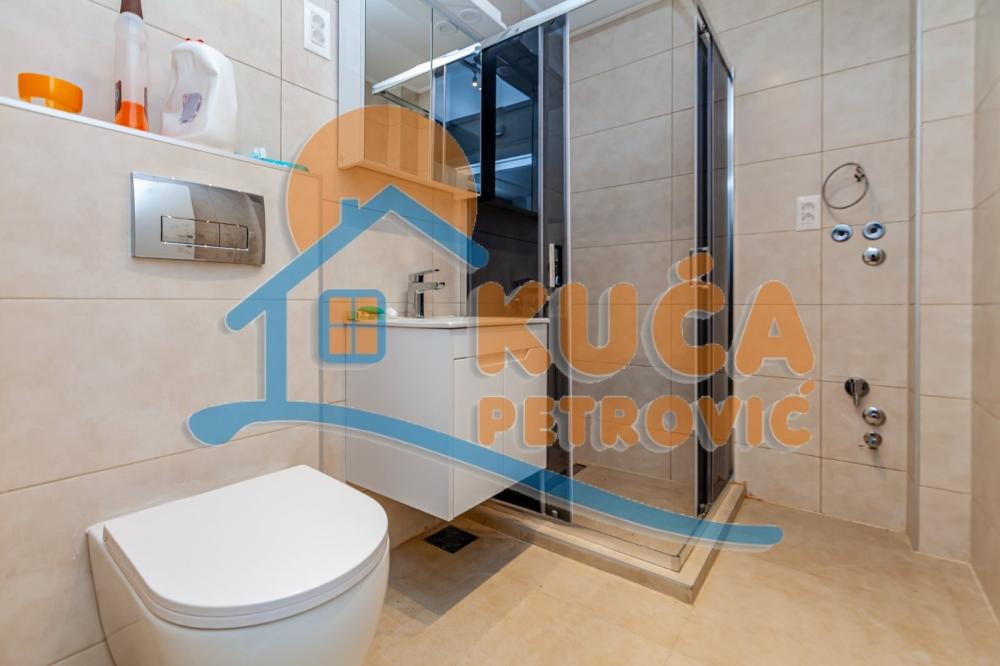 Slika 8 - Stan u zgradi, novogradnja, uknjižen, etažno grejanje, oglas ID p-015164