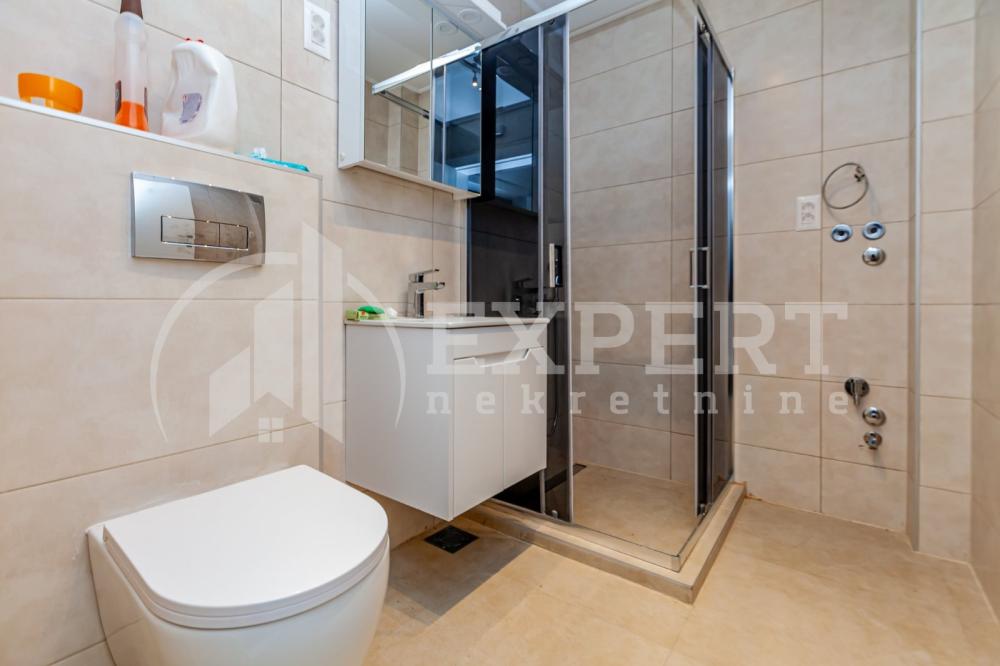 Slika 8 - Stan u zgradi, novogradnja, uknjižen, etažno grejanje, oglas ID p-015164