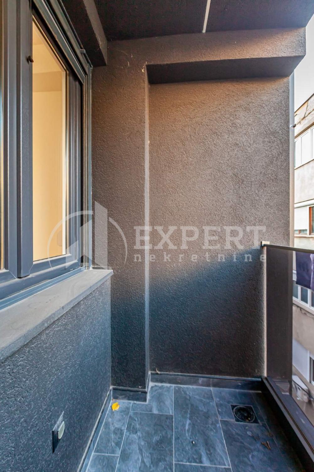 Slika 9 - Stan u zgradi, novogradnja, uknjižen, etažno grejanje, oglas ID p-015164