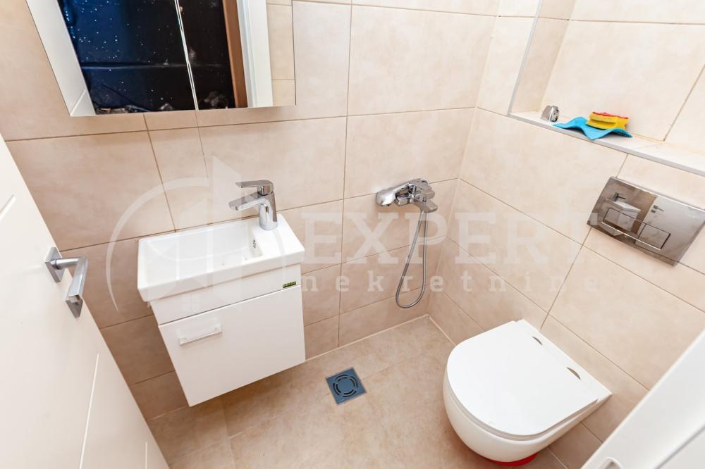 Slika 4 - Stan u zgradi, novogradnja, uknjižen, etažno grejanje, oglas ID p-015164