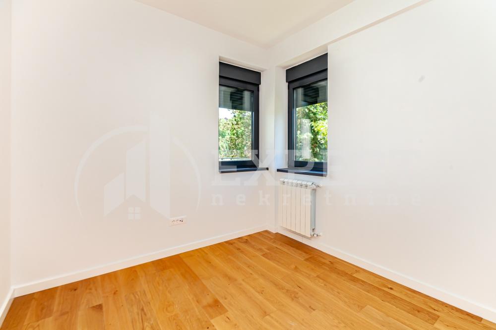 Slika 8 - Stan u zgradi, novogradnja, uknjižen, centralno grejanje, oglas ID p-015141