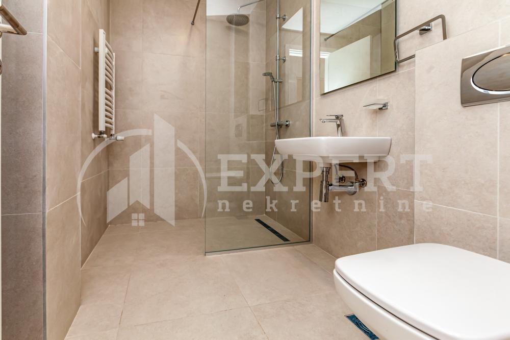 Slika 6 - Stan u zgradi, novogradnja, uknjižen, centralno grejanje, oglas ID p-015139