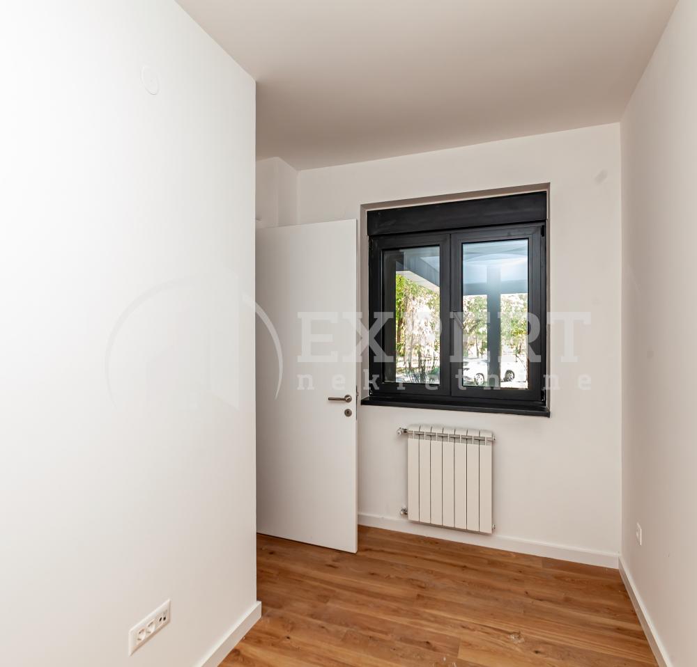 Slika 6 - Stan u zgradi, novogradnja, uknjižen, centralno grejanje, oglas ID p-015137