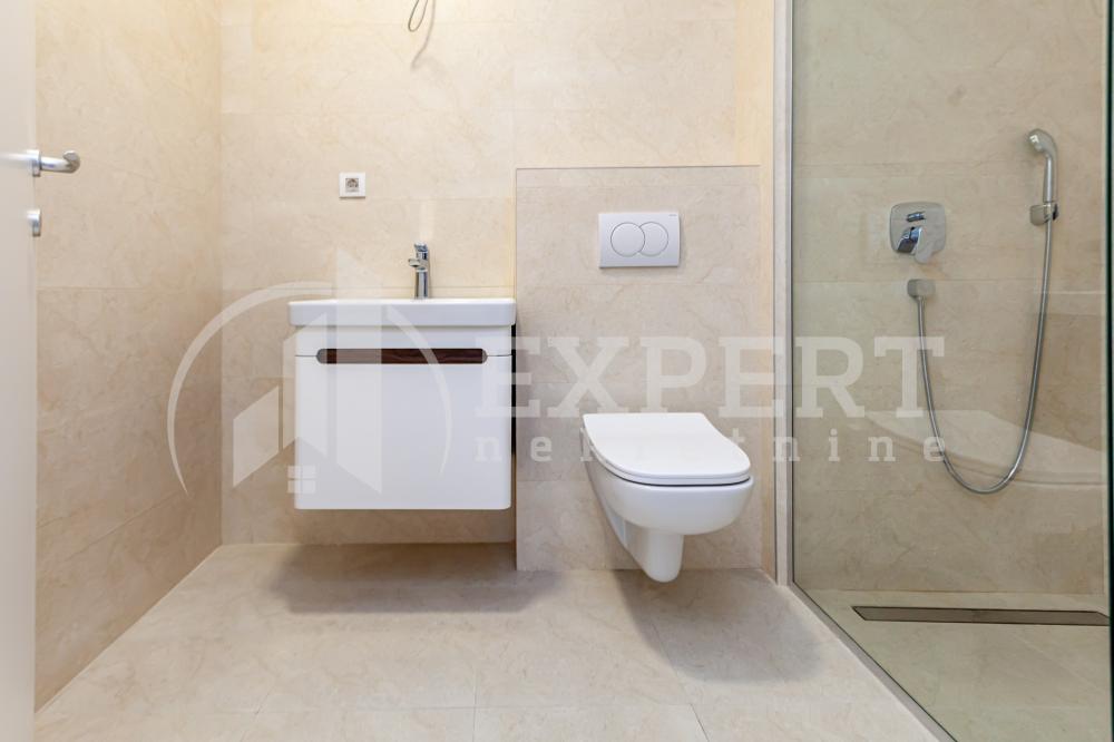 Slika 9 - Stan u zgradi, novogradnja, uknjižen, etažno grejanje, oglas ID p-015080