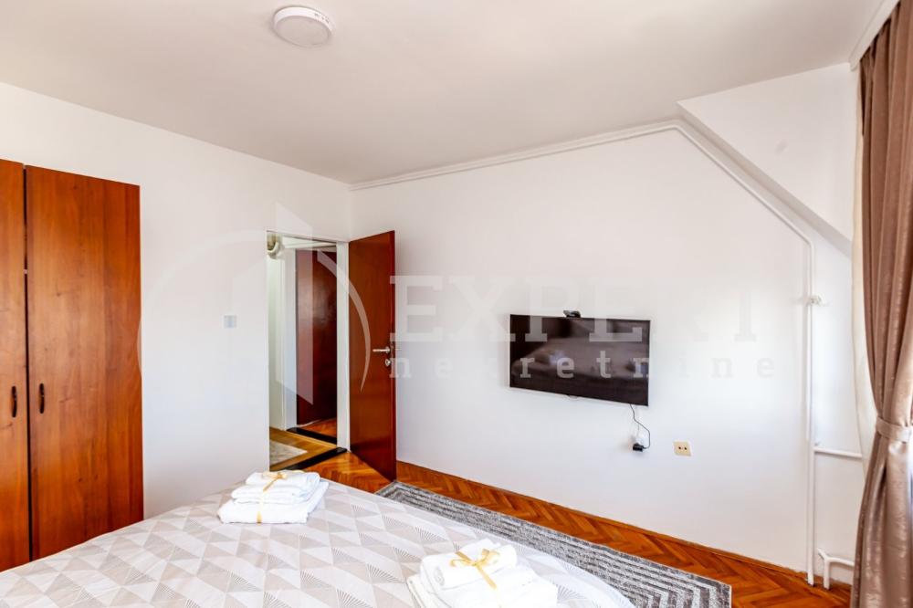 Slika 2 - Stan u zgradi, uknjižen, centralno grejanje, oglas ID p-015115